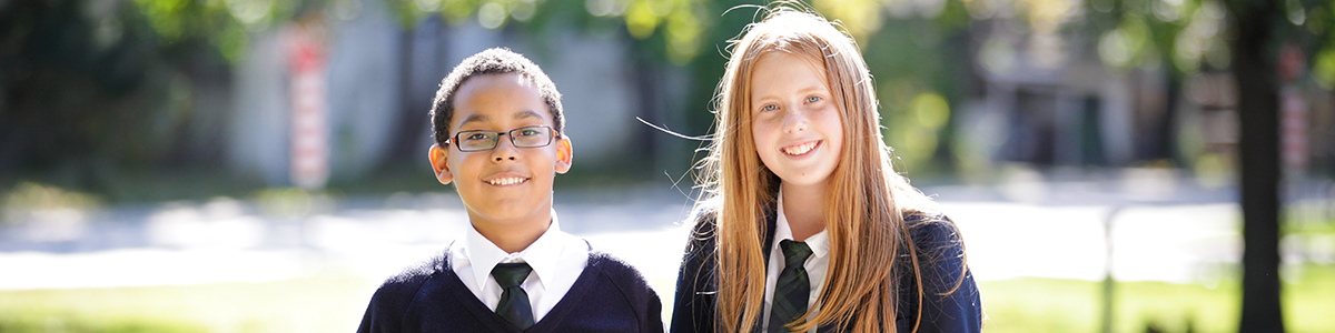 Intermediate Division boy and girl outside on a spring day