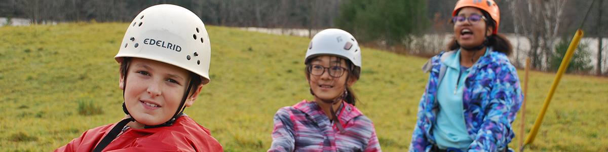 A group of students on the high ropes course