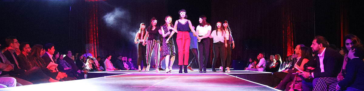 High School Division boys and girls on stage at annual charity Fashion Show