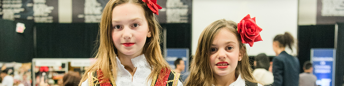 Two Primary Division girls in traditional dress at annual Celebration of Cultural Diversity
